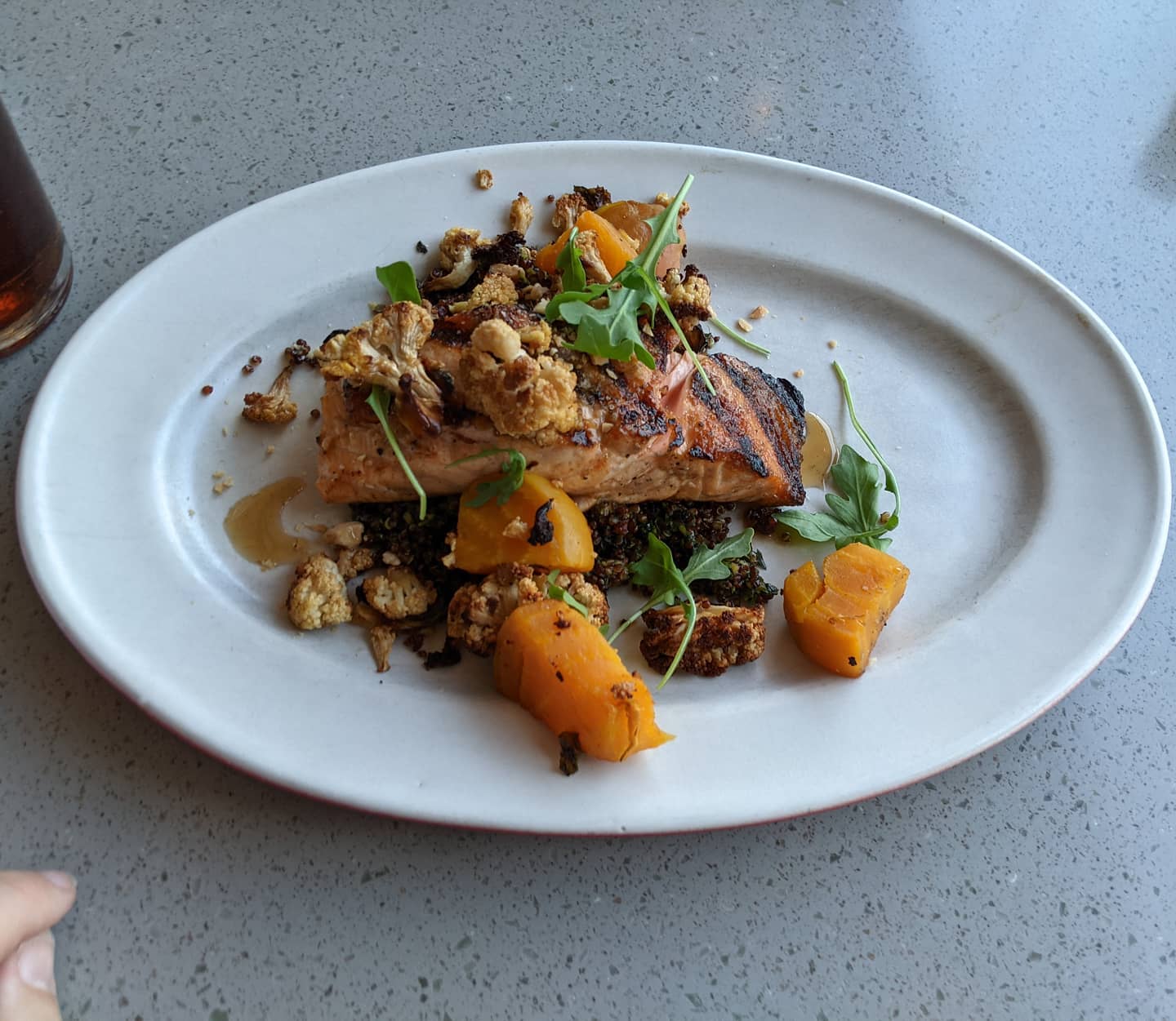 Tonight's #phoenix #foodporn is a simple salmon filet over pesto quinoa. And a beer.