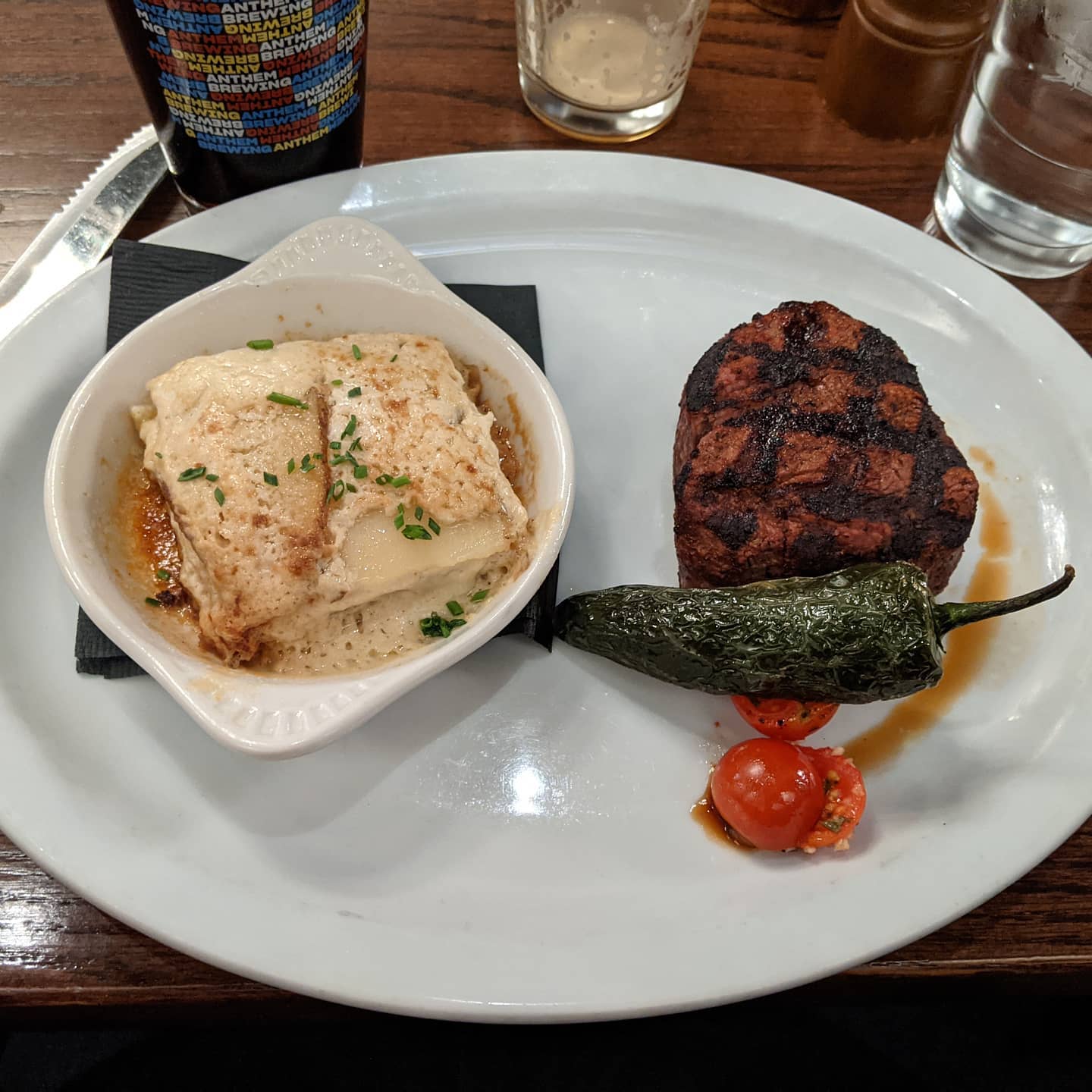 Oklahoma #foodporn. 8oz filet with au gratin potatoes. And a Guinness... #okc