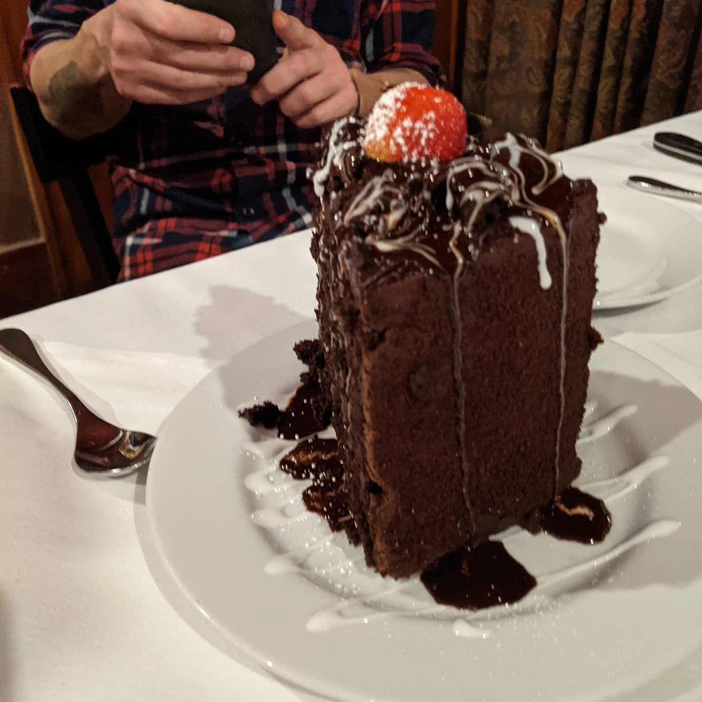 And this is what you get in when you fail to notice that the menu specifies that the chocolate cake is "sharing size". #okc #foodporn