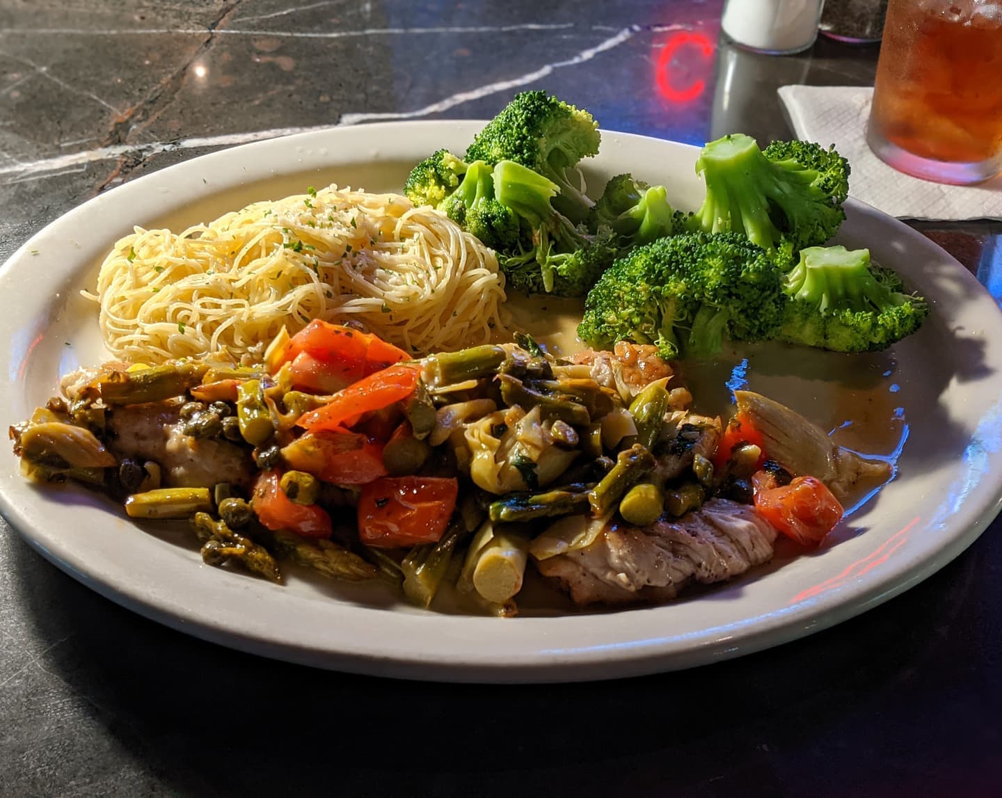 After a lot of exercise today, an awesome chicken piccata along with entertainment from Morgan the musical bartender at Charleston's in Bricktown #okc #oklahoma #foodporn