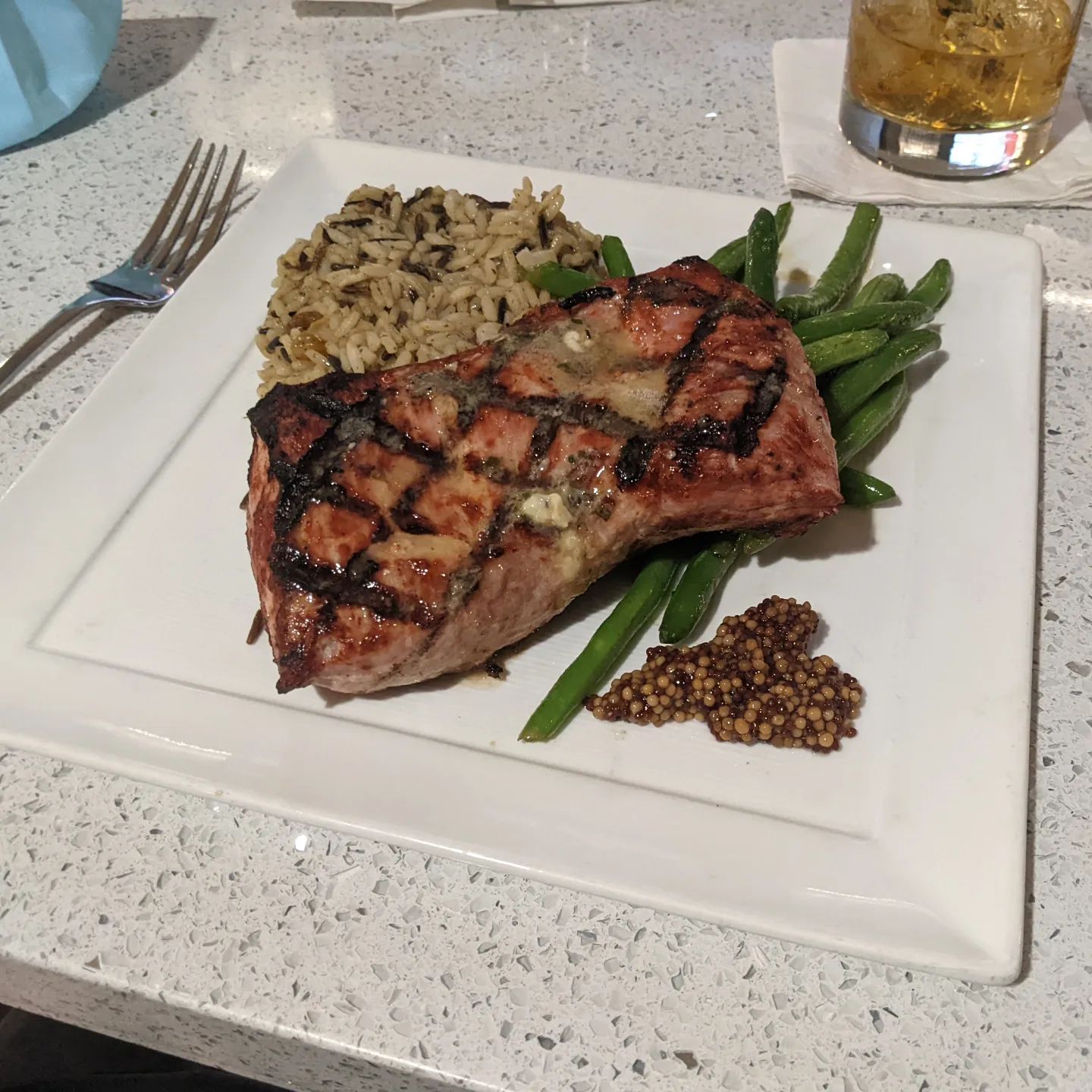 Hotel bar, but I only made it 1/3 of the way home due to work and then weather. #foodporn tonight is a flatiron pork steak with wild rice and green beans. Amazingly good for a hotel bar.