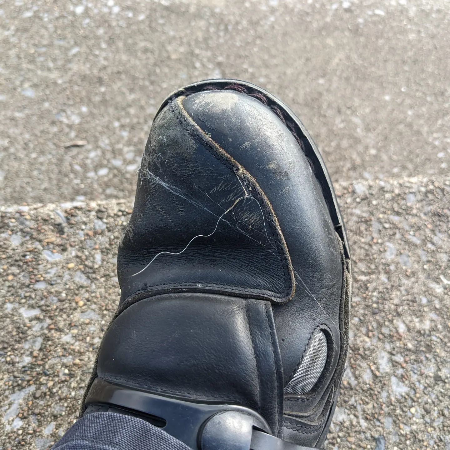 Morning coffee in Paducah on the riverfront 200 miles from home... I look down and there's HUSKY HAIR STUCK TO MY BOOT!!! #siberianhusky #huskylife