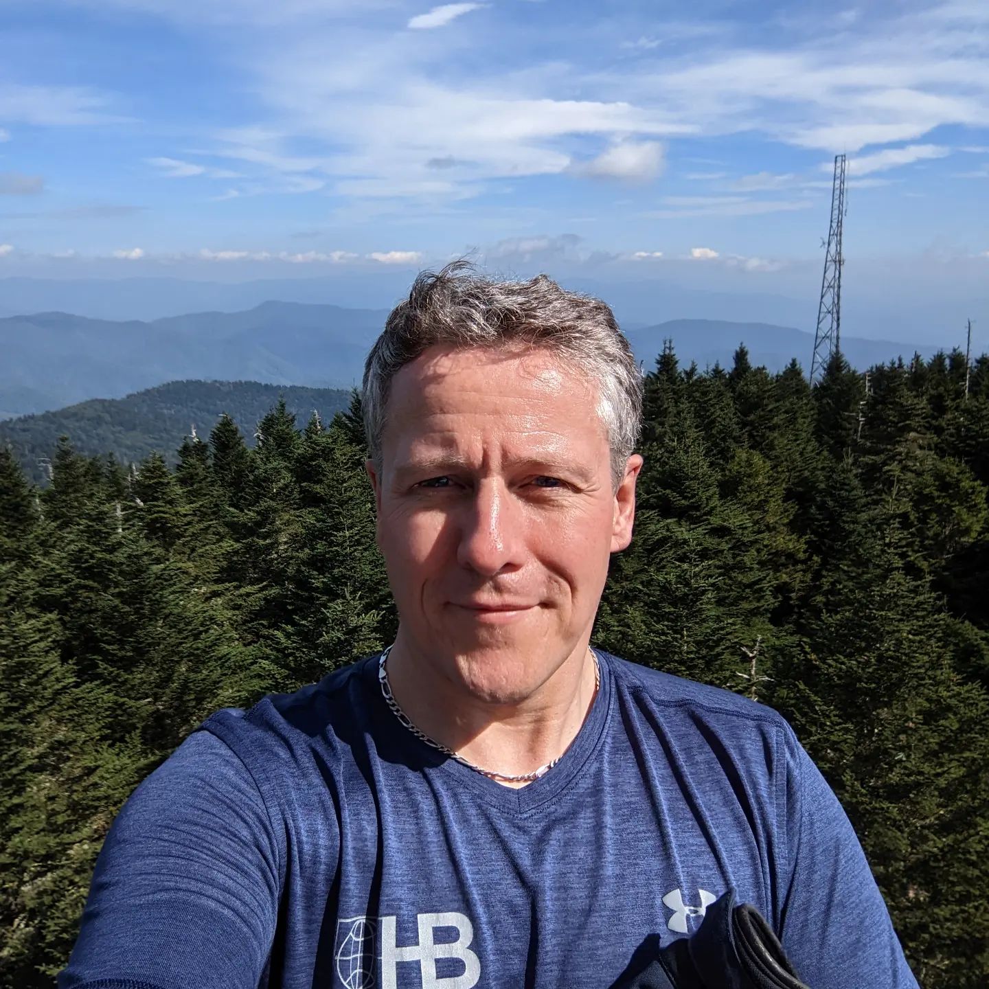 Ah there it is... Found the top of the world... I hiked half a mile and 300 feet of elevation change in motorcycle boots to get here too lol. Oh... Helmet hair... Don't care