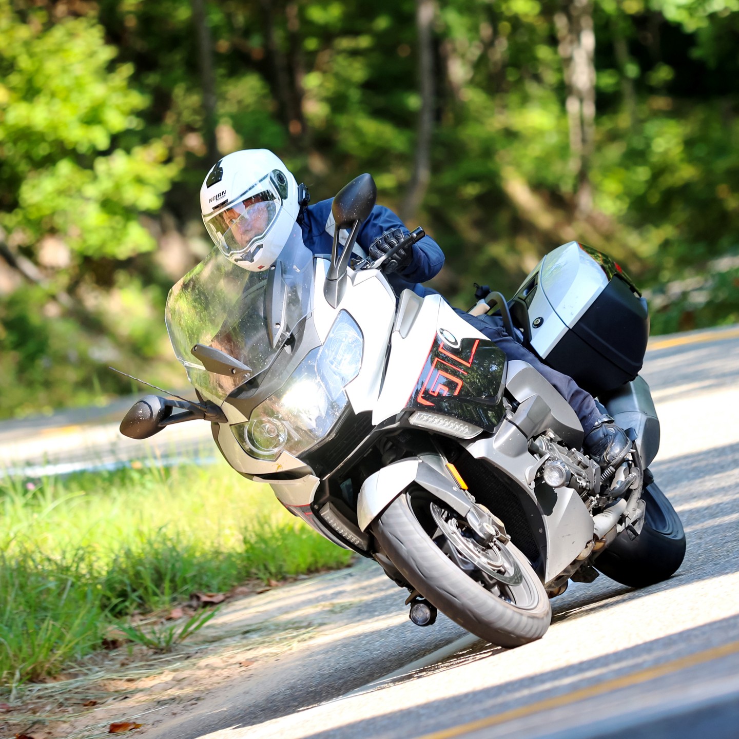 Looks like I was spotted on the Tail of the Dragon by @killboy during my recent trip. Such an amazing ride... this picture even nicely caught the dead bug on my fender and how disgusting my windshield was :) #motorrad Shame my boots didn't survive the trip.